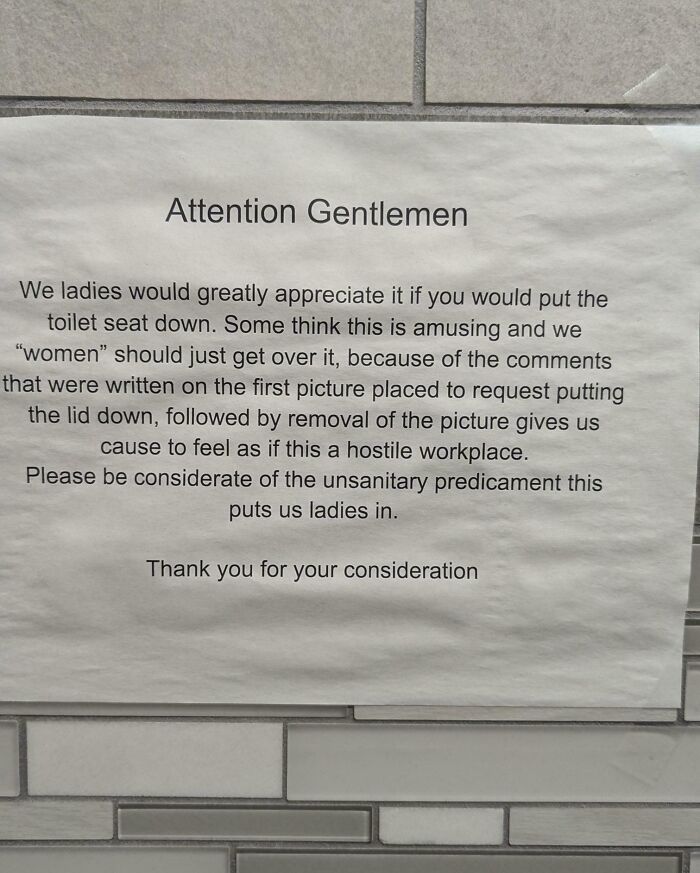 Sign using suspicious quotation marks around women, requesting gentlemen to put the toilet seat down in the workplace.
