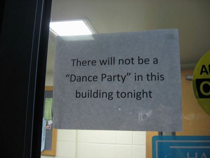 Sign with suspicious quotation marks around dance party, humorously implying no real dance event tonight in building.