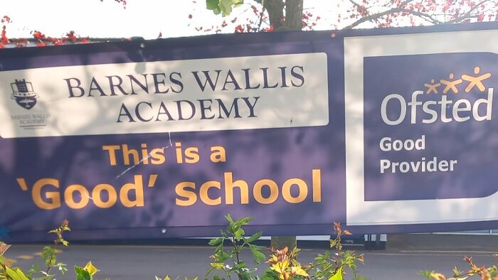 School sign with quotation marks around the word Good, creating a hilariously suspicious message.