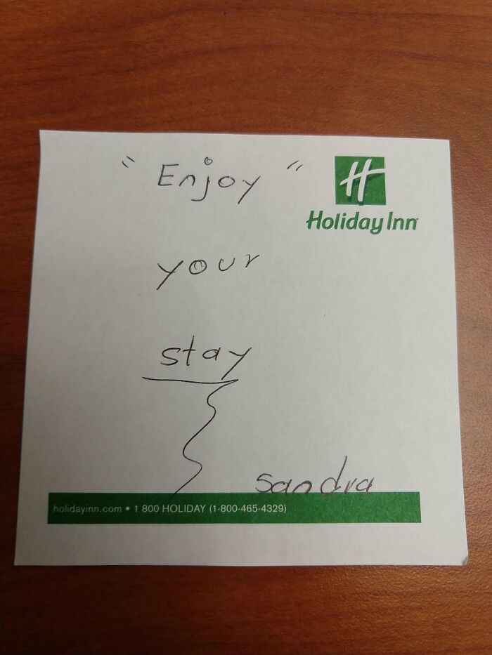 Handwritten note from Holiday Inn with suspiciously placed quotation marks around the word Enjoy, showing funny punctuation misuse.