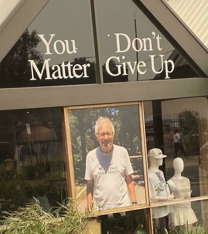 An ironic 'you had one job' funny fail with text on a window saying 'You Don't Matter Give Up' and 'You Matter Don't Give Up'.