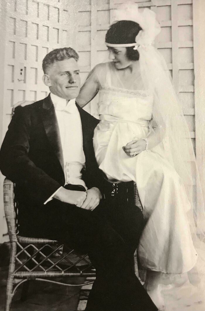 Vintage black and white photo of a bride and groom in wedding attire from decades ago, reflecting timeless moments.
