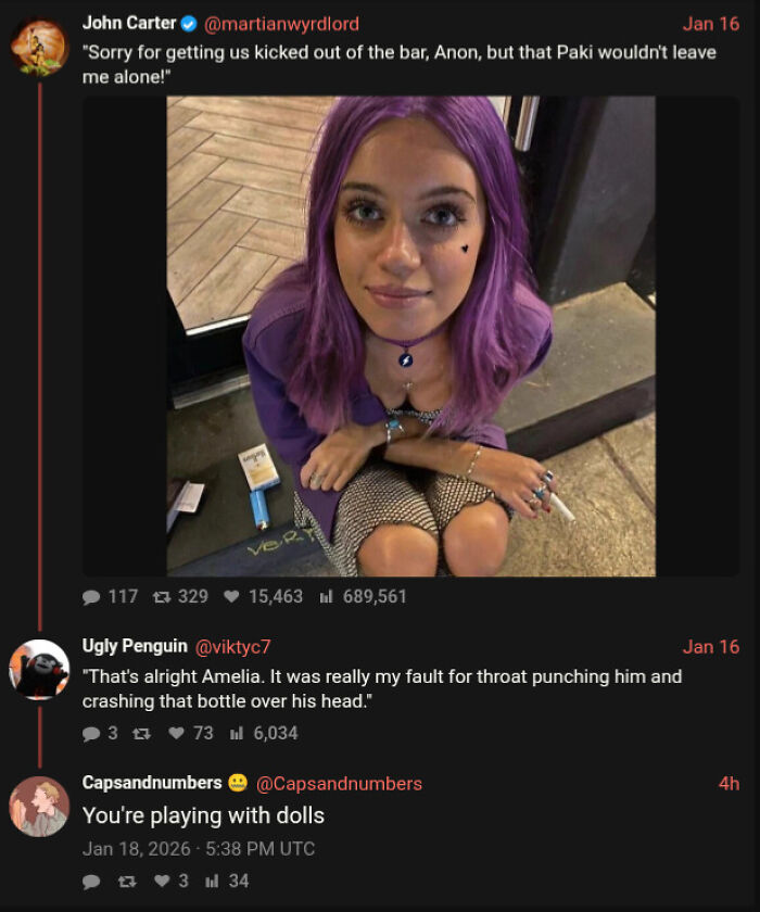 Young woman with purple hair sitting on floor with social media conversation