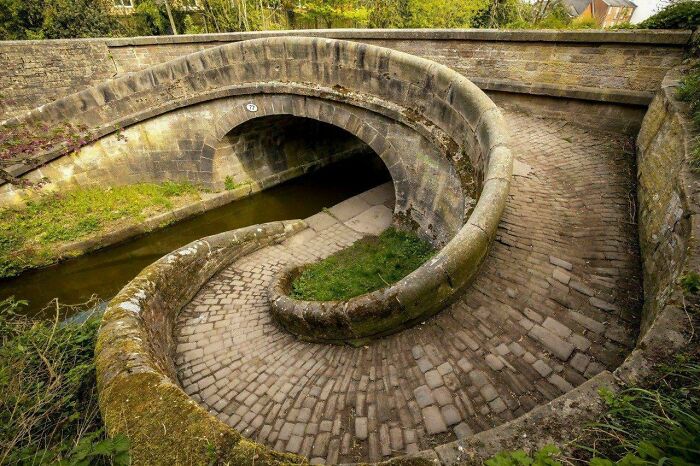 Stone spiral canal bridge structure showcased as unique historical finds.