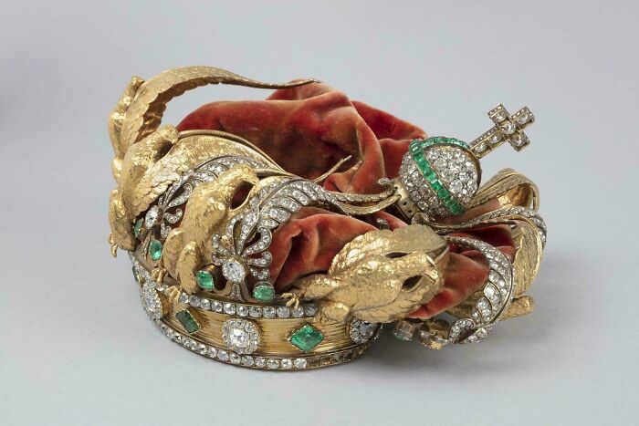 Ornate jeweled crown with gold eagle accents, one of many incredible historical finds.