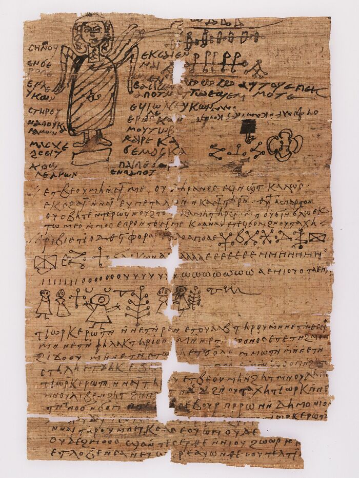Ancient Egyptian papyrus scroll with Greek script and illustrations, showcasing unique historical finds.