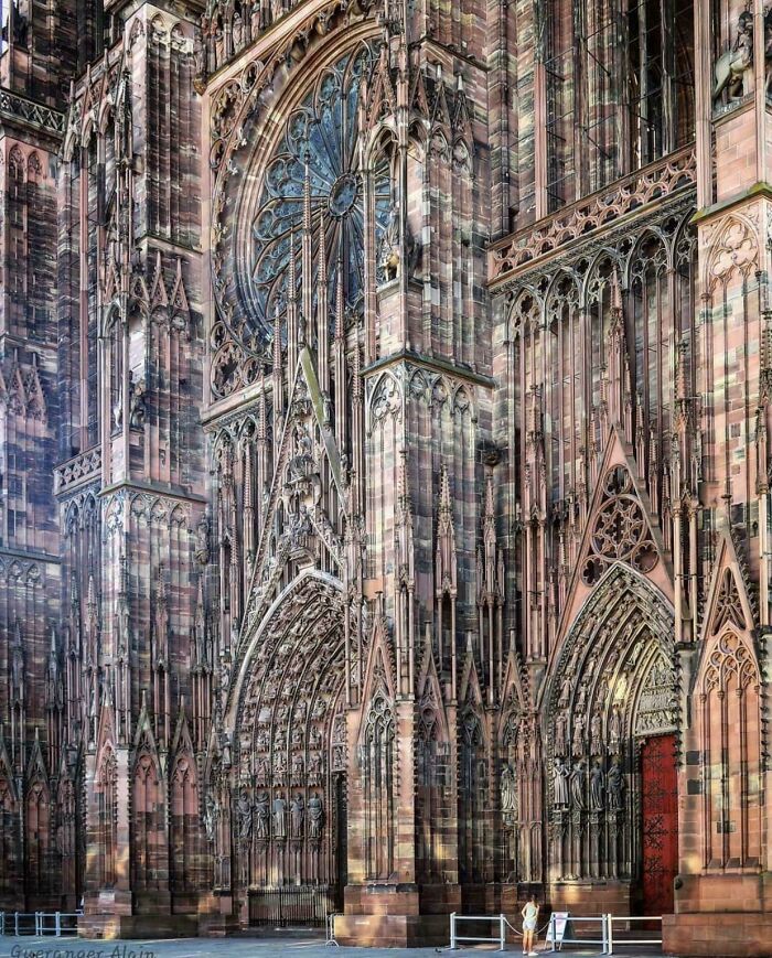 Intricate Gothic cathedral facade with detailed stone carvings, an amazing historical find.