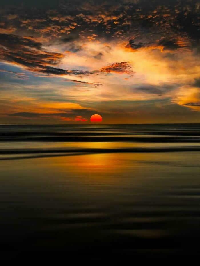 Sunset Over The Ocean