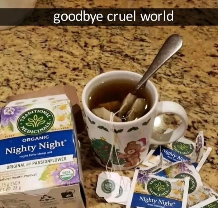 Mug of tea with Nighty Night herbal tea bags and packaging on a kitchen counter, representing funny relatable memes.