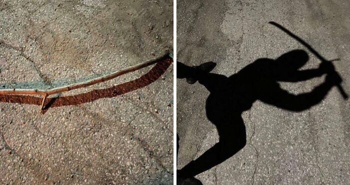 Shadow of a person holding cool sticks creating a dynamic silhouette on a textured pavement surface.