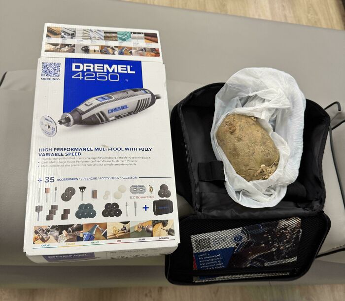 Dremel 4250 multi-tool box with a potato inside the carrying case, illustrating disappointing shopping fails and trust issues.