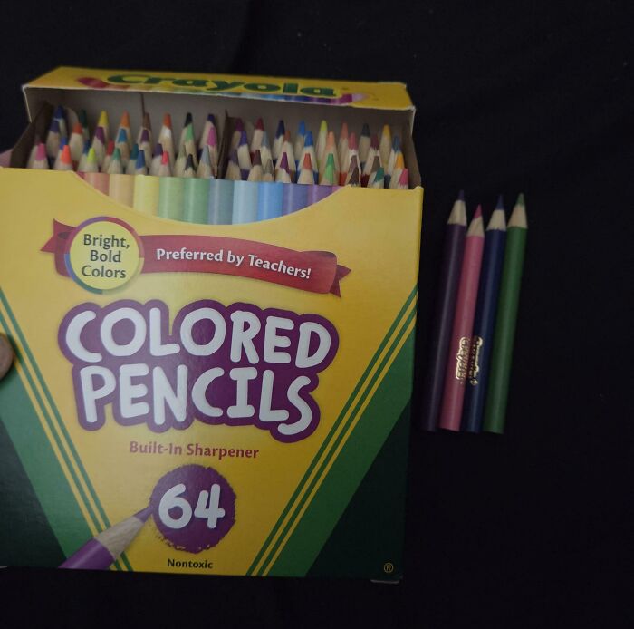 Box of 64 colored pencils with built-in sharpener, some pencils missing, illustrating disappointing shopping fails.