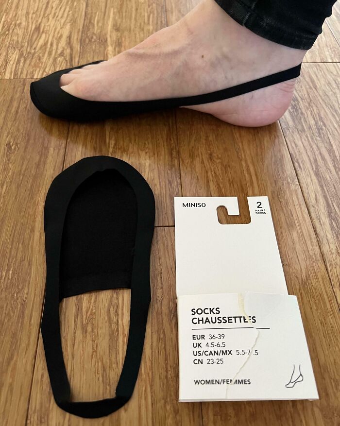 Disappointing shopping fail showing extremely small socks that barely fit the foot, causing trust issues with purchases.