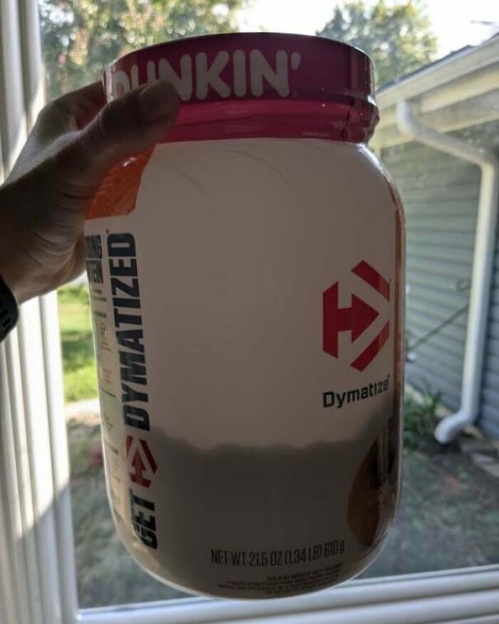 Hand holding an empty protein powder container highlighting disappointing shopping fails causing trust issues.