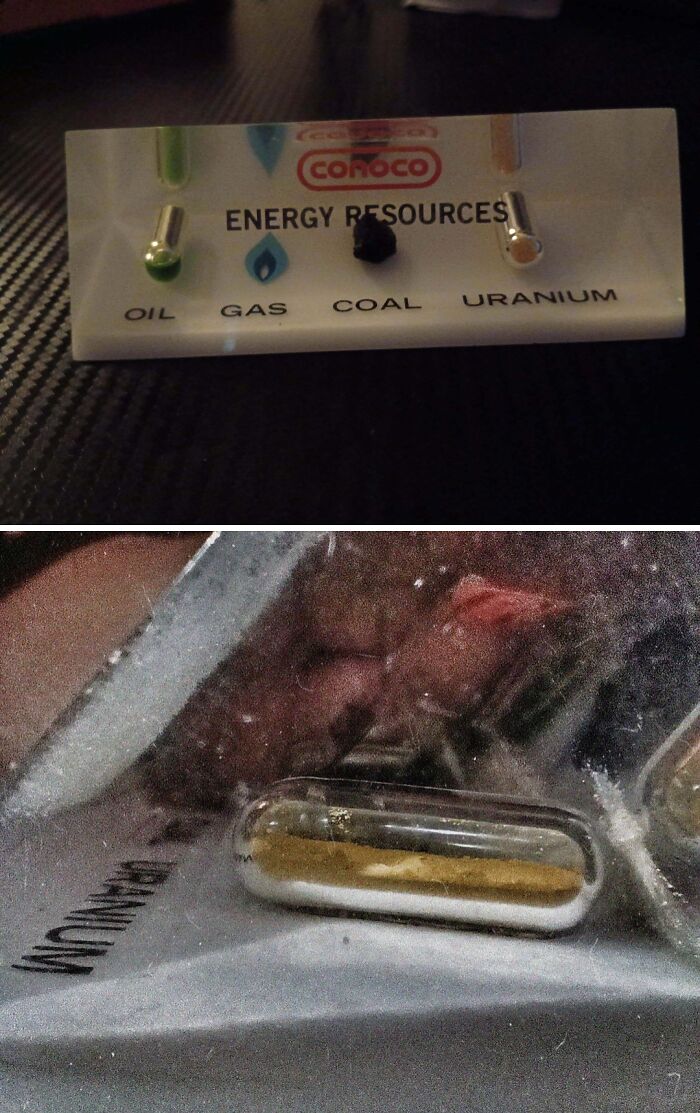 Strange pics showing a Conoco energy resources display with oil, gas, coal, uranium samples under confusing lighting.