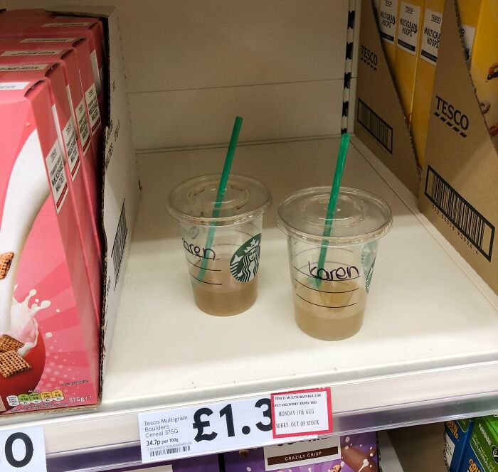 Two Starbucks cups labeled Karen on supermarket shelf near Tesco cereal, highlighting entitled Karens and public call-out culture.