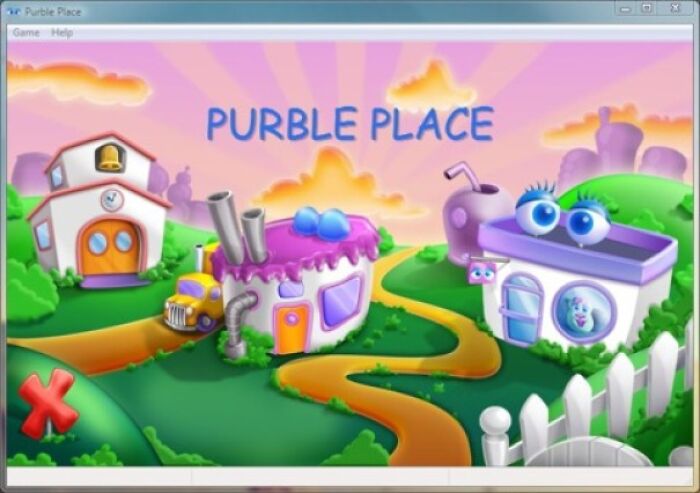 Screenshot of the 2010s game Purble Place showing colorful cartoon buildings and a winding path in a vibrant landscape.