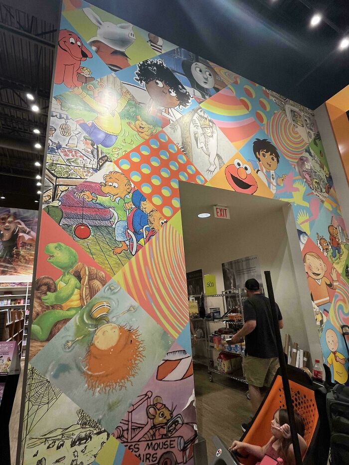 Colorful mural featuring popular 2010s cartoon characters in a public space, evoking nostalgia for better times in the 2010s.