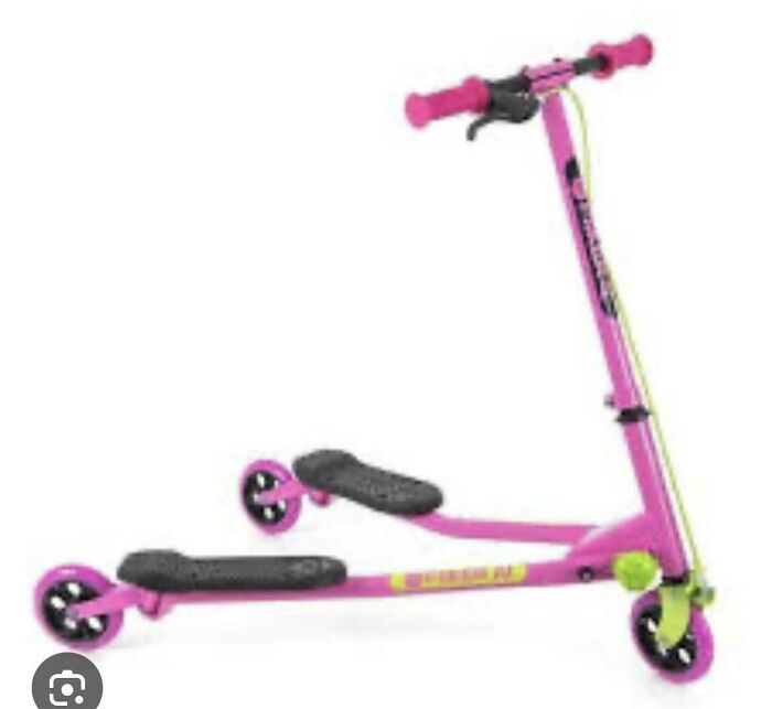 Pink three-wheeled scooter with foot pedals, a popular 2010s toy for active outdoor play and fun childhood memories.