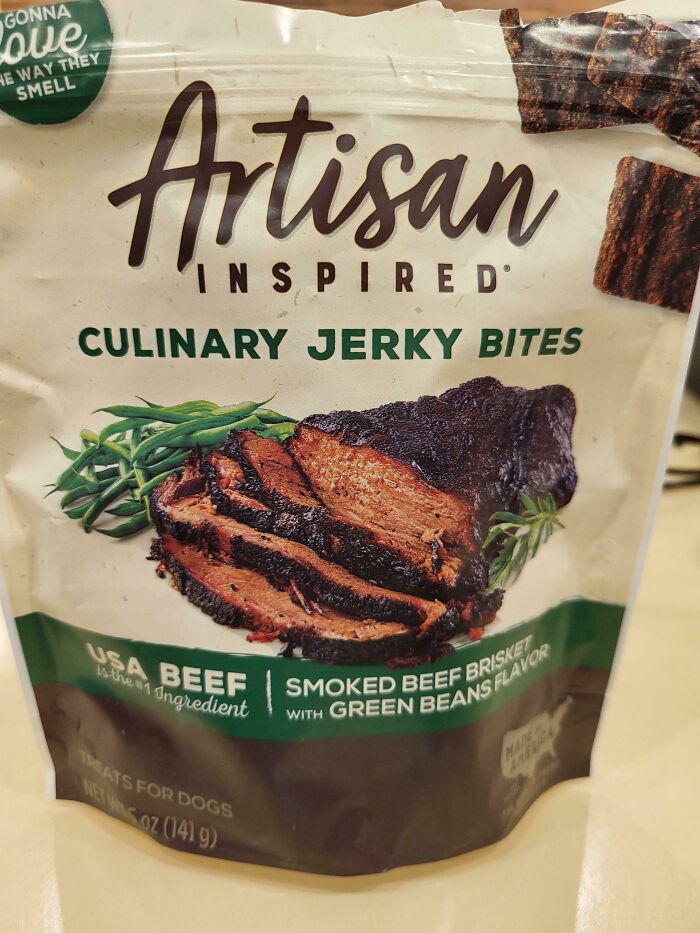 Artisan inspired culinary jerky bites packaging with smoked beef brisket and green beans flavor for dogs.