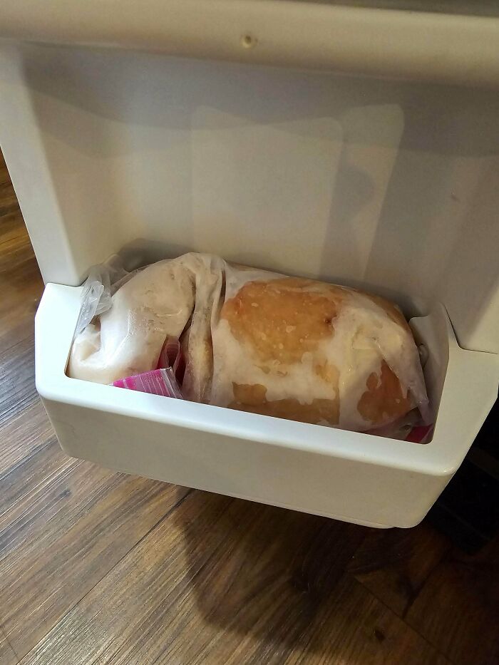 Frozen bread stored in a freezer door compartment, illustrating a disaster from forgetting what could go wrong.