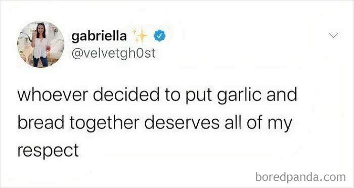 Tweet text appreciating the combination of garlic and bread, showcasing British humor in a simple social media meme.