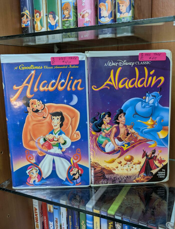 Two Aladdin VHS tape covers side by side, showing a shameless designer copy of the famous brand style.