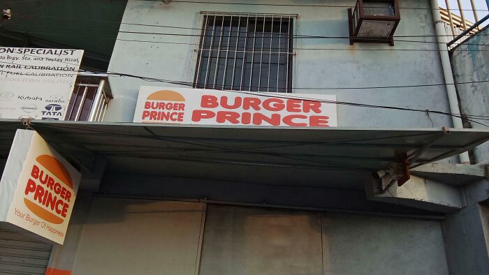 Sign for Burger Prince restaurant mimicking a famous brand logo, showcasing shameless designer copying of well-known brands.