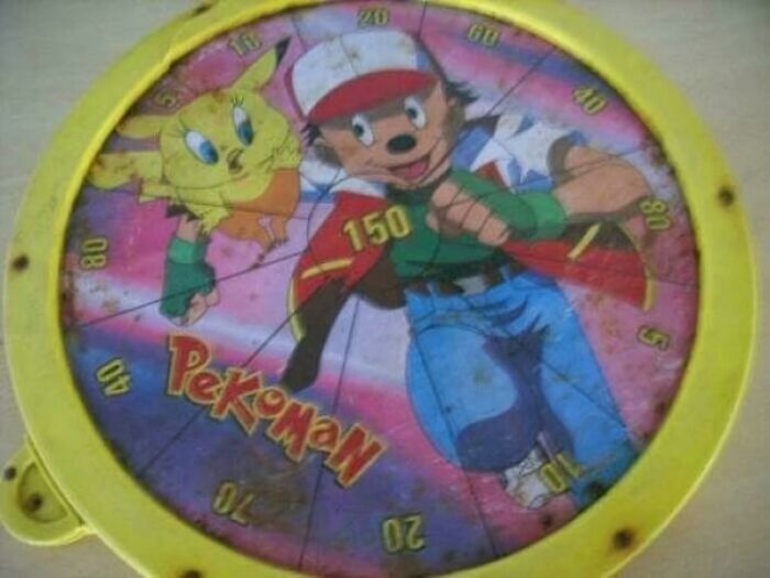Yellow dartboard featuring a poorly copied Pokemon design with altered characters and misspelled brand name.