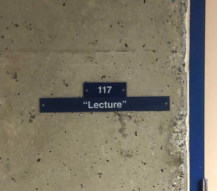 Sign with suspicious quotation marks around the word Lecture on a concrete wall, illustrating funny quotation marks usage.