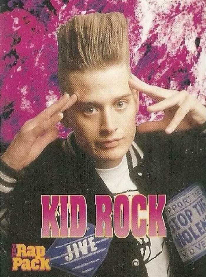 Young Kid Rock with a tall flat top hairstyle, posing with fingers near temples in a bizarre throwback moment from the 1990s.