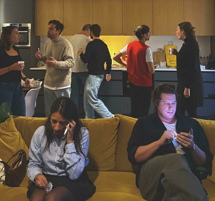 A busy party scene with people on phones and chatting, capturing an Accidental Renaissance feel.