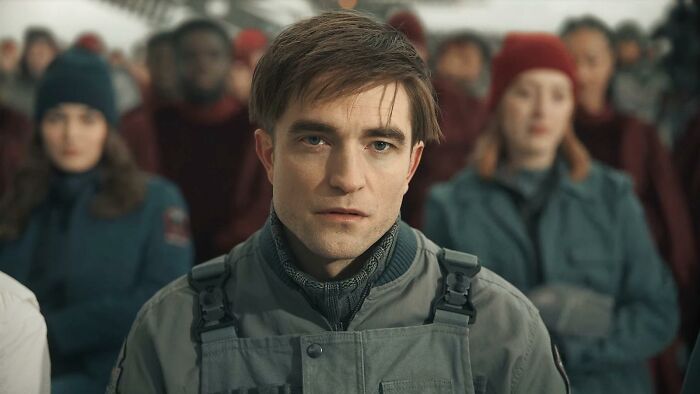 Robert Pattinson as an actor in Dune 3, portraying an unusual villain role in a futuristic military setting.