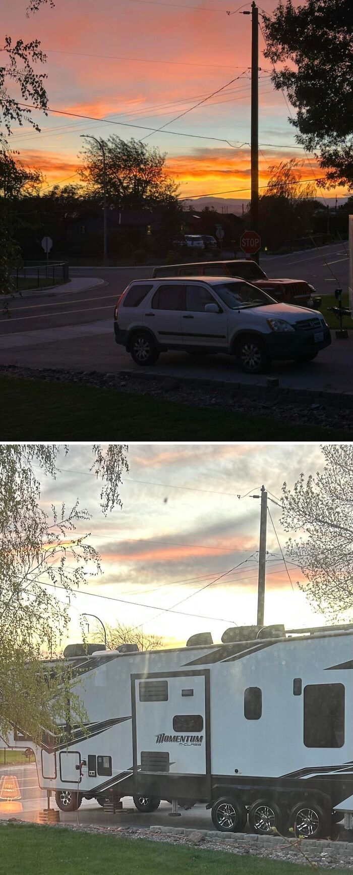 White SUV and large camper trailer parked near a quiet neighborhood street at sunset, peaceful remote setting with few neighbors.
