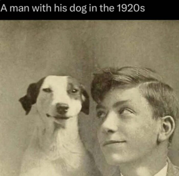 Vintage black and white photo of a man and his dog from the 1920s illustrating facts about the world and nature.