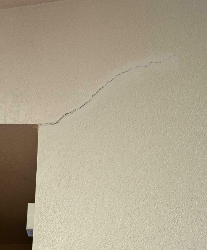 Wall crack inside a home showing damage, highlighting common issues people faced after buying homes and regretted it.