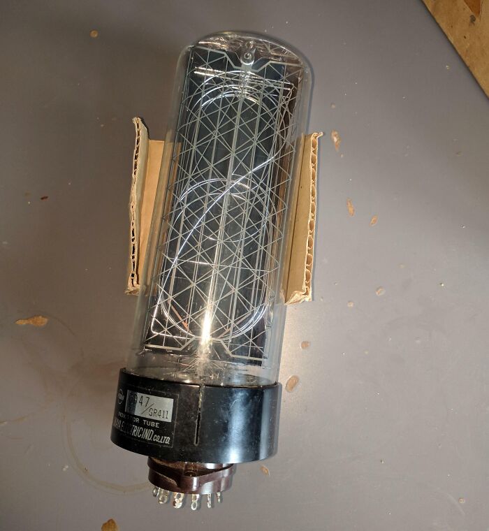 Vintage electronic vacuum tube with visible wiring, an example of unidentified objects solved by the internet community.