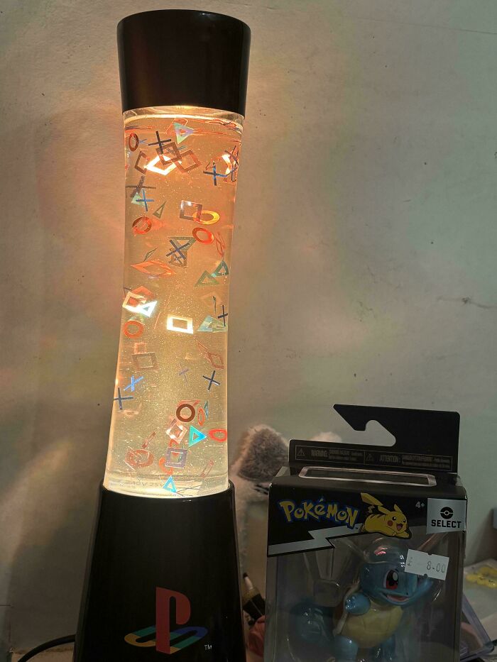 A PlayStation lava lamp and a Pokemon Squirtle figure, a jackpot find at the thrift store.