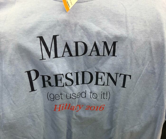 Old photo of a faded Hillary 2016 Madam President shirt, a vintage image that aged poorly and causes facepalm reactions.