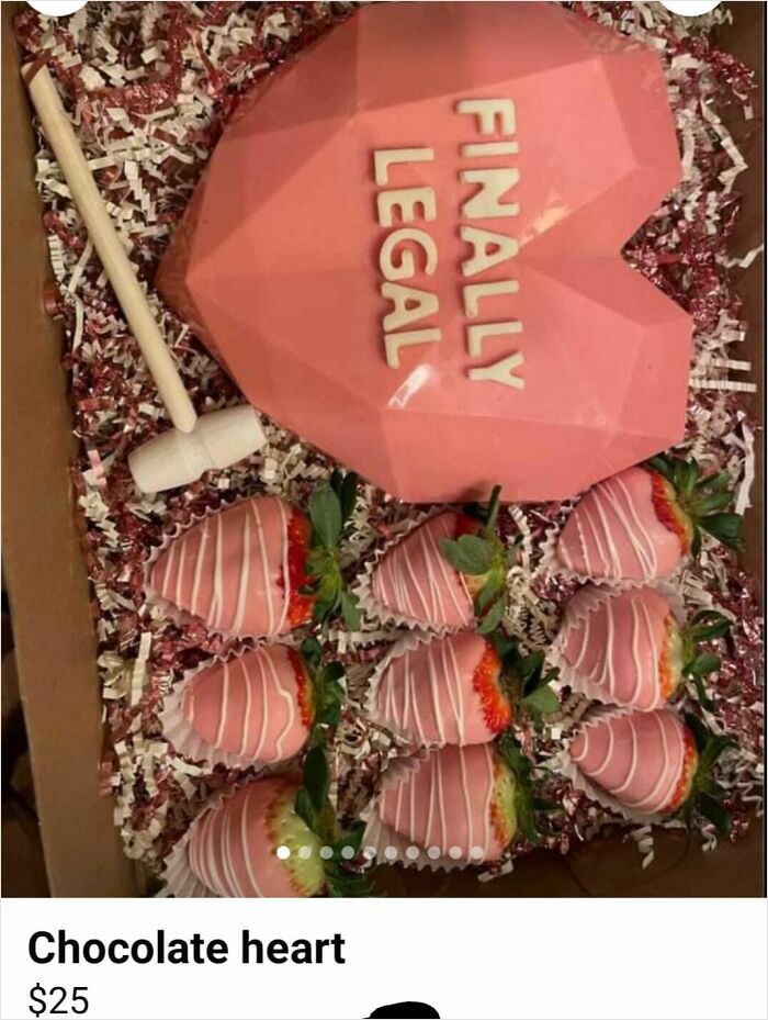 Pink chocolate heart with "finally legal" text and matching dipped strawberries in a quirky Facebook Marketplace listing.