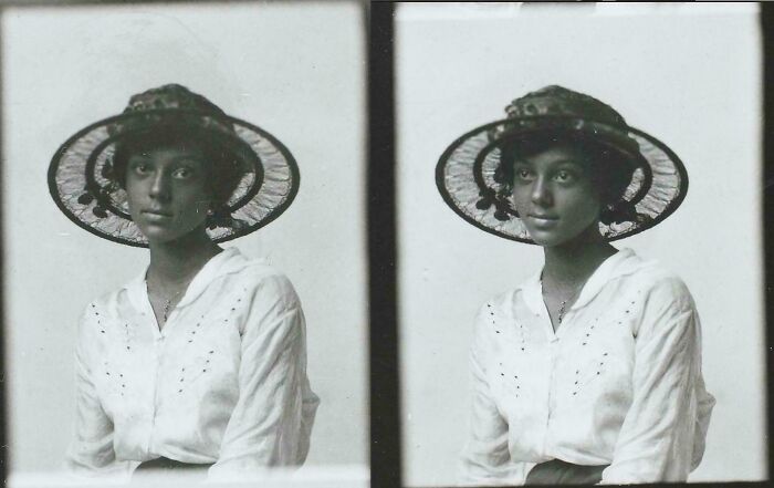 A candid old photo showing a woman in a wide-brimmed hat, capturing what the world looked like generations ago.