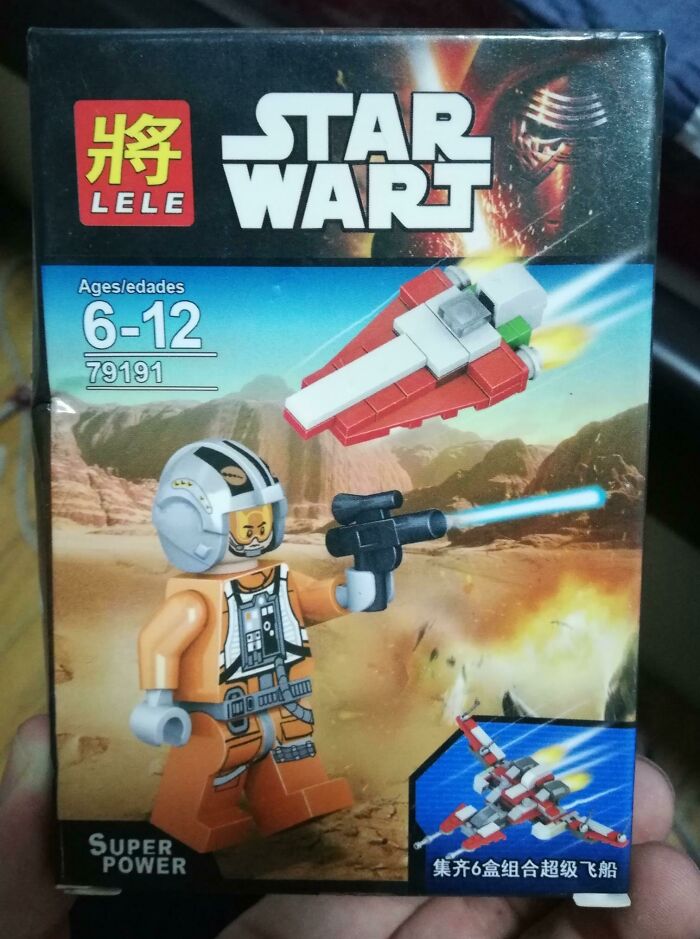 Box of a shameless designer toy "Star Wart" with a LEGO-like figure and spaceship, copying famous brand style and theme.