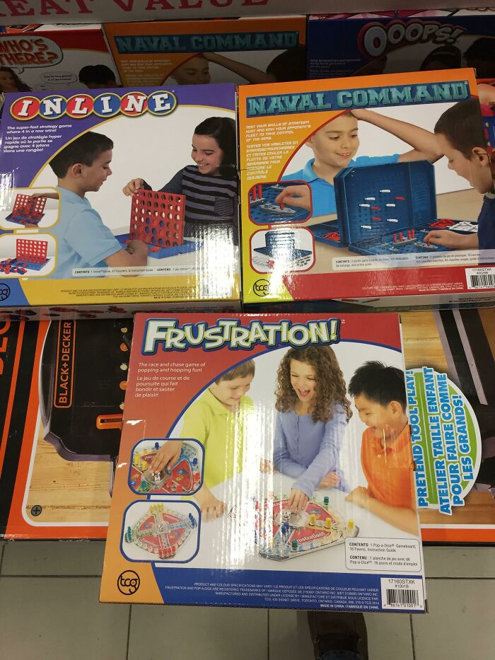 Boxes of shameless designer copies of classic board games Connect Four, Battleship, and Frustration on store shelves.