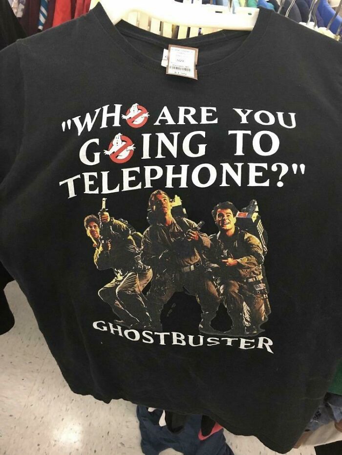 Black t-shirt featuring a misspelled Ghostbusters quote with characters and logo, showcasing hilariously bad t-shirt designs.