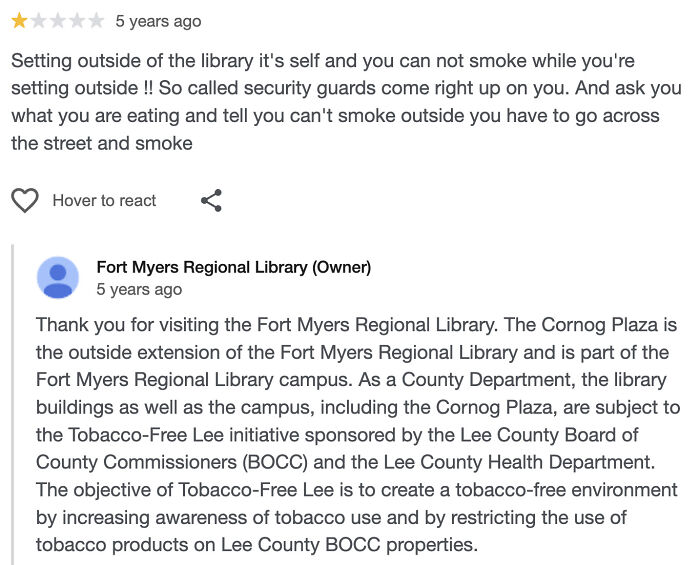 One-star review complaining about smoking rules outside a library, illustrating entitled people misunderstanding rules.