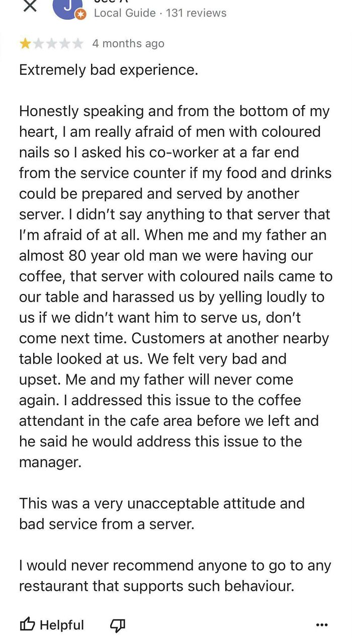 Absurd review from entitled customer complaining about colored nails and bad service at a restaurant.