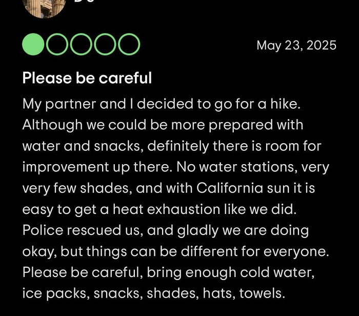 Screenshot of an absurd review describing a hiking experience with heat exhaustion and police rescue warnings.