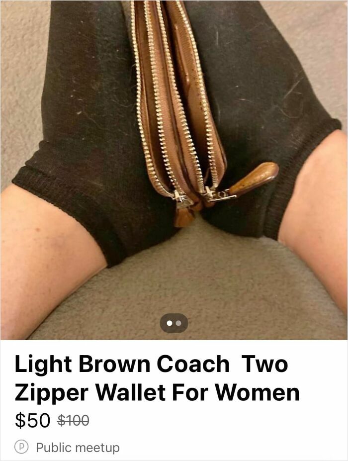 Light brown Coach wallet with two zippers held between feet wearing black socks, an unhinged Facebook Marketplace listing.