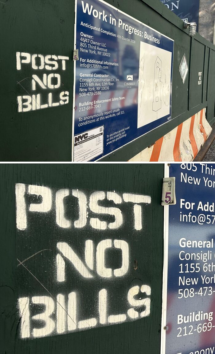 Urban anarchist graffiti with bold white POST NO BILLS stencil on green construction barriers in New York City.