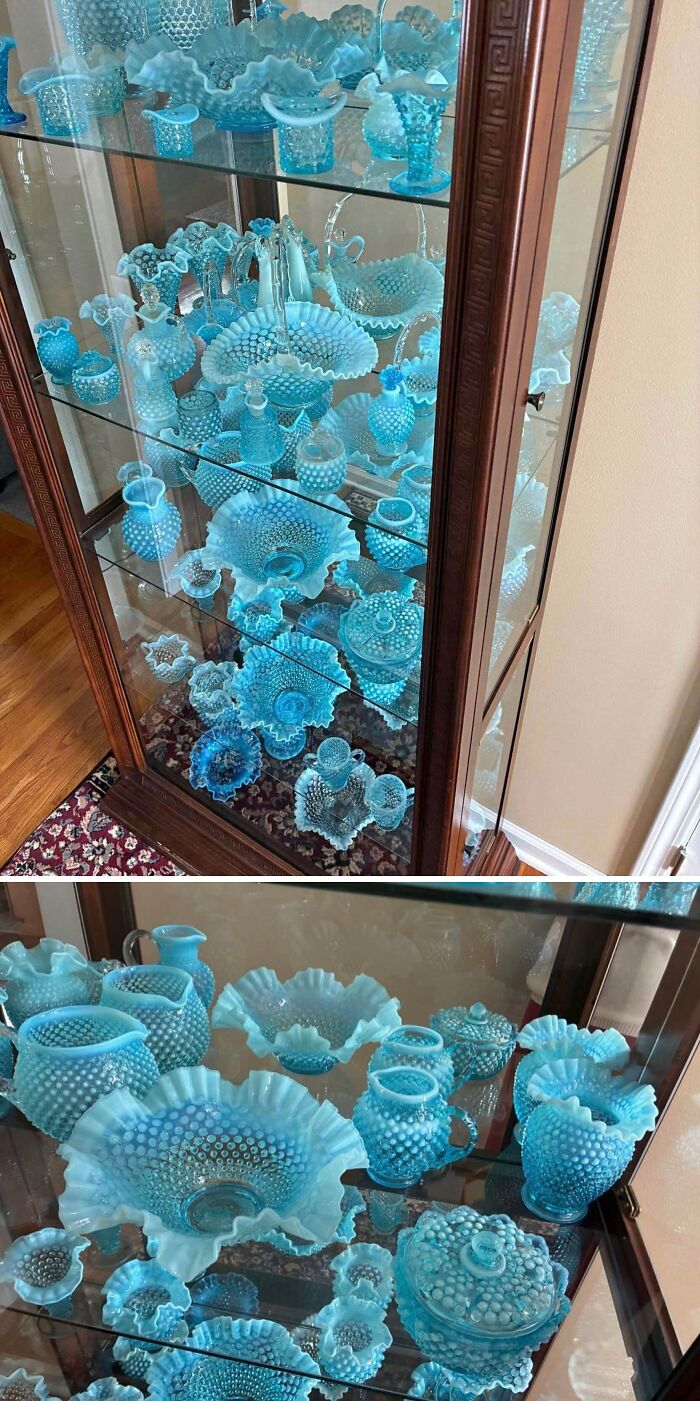 Collection of cool and creative blue glass items displayed in a wooden cabinet, perfect decorative glass pieces for your home.